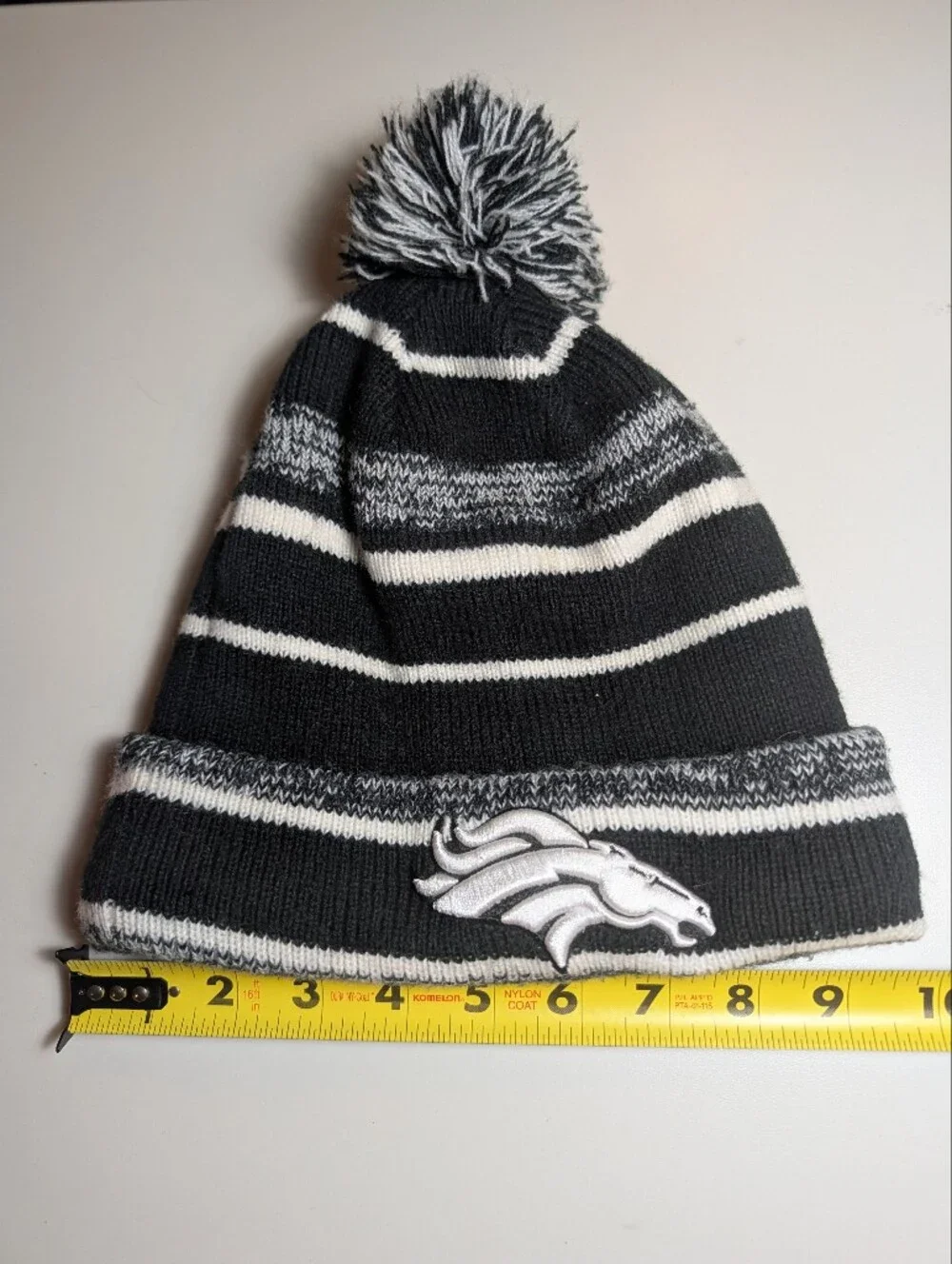New Era Denver Broncos Black, Gray & White Pom Cuffed Beanie with Team Patch